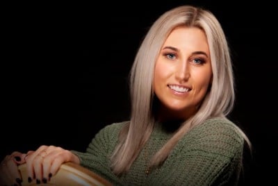 female patient after smile transformation with cosmetic dentistry